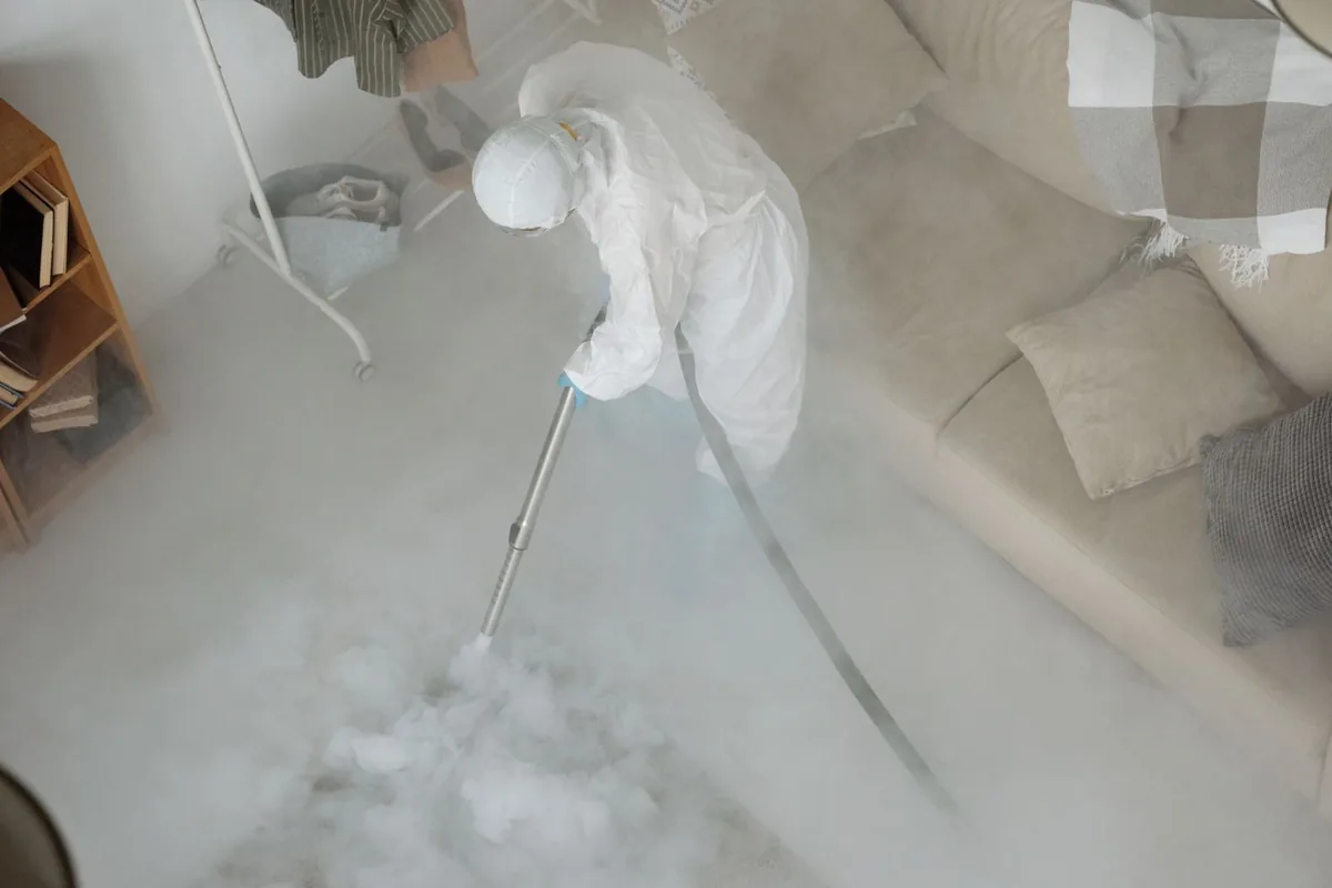 Biohazard cleanup technician in protective equipment, Susanville, CA